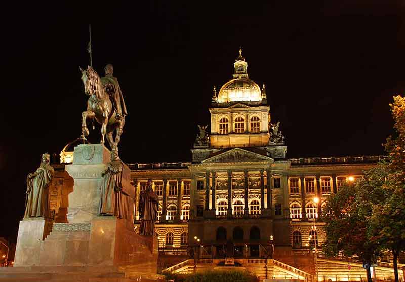 prague night at the museum national museum building and statue lit up at night