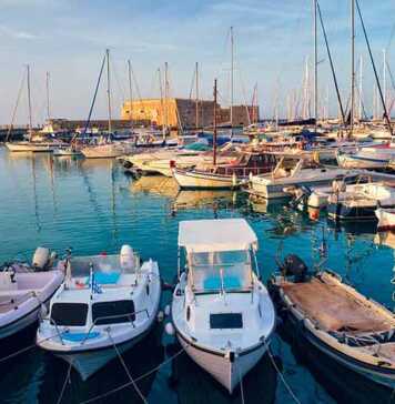 Venetian Fort In Heraklion And Moored Fishing Boats, Crete Island