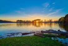 20 Best Things To Do In Rogers Arkansas sunset on Beaver Lake near rogers arkansas