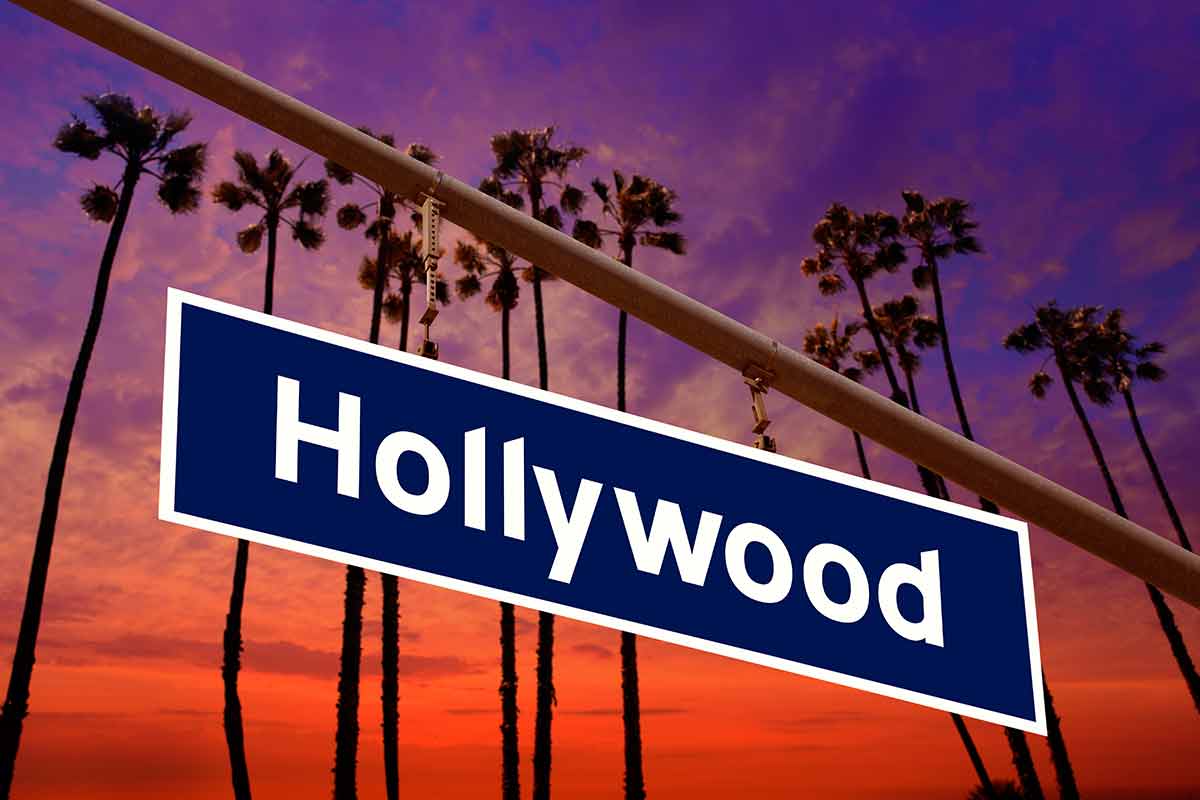 san francisco to san diego road trip Hollywood California road sign on redlight with pam trees sky photo mount