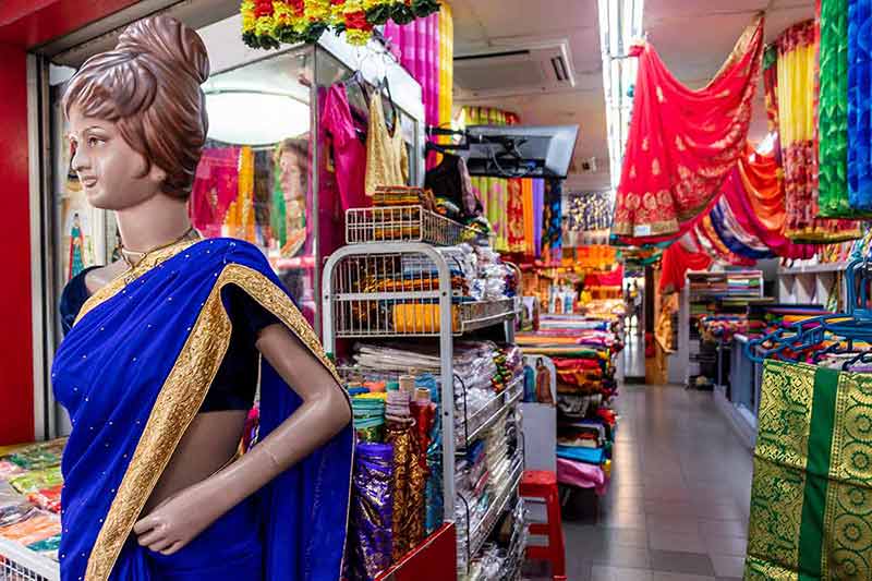 Mannequin In Front Of A Colorful Sari Shop, Little India.