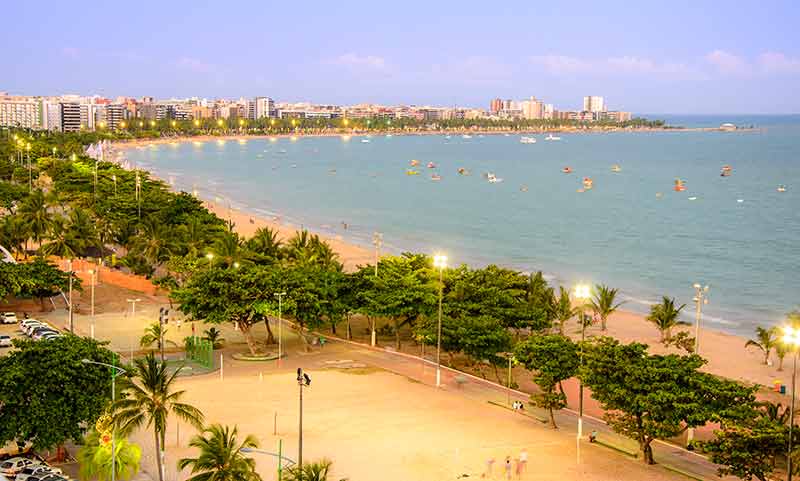 waterfront and beach of maceio at sunset