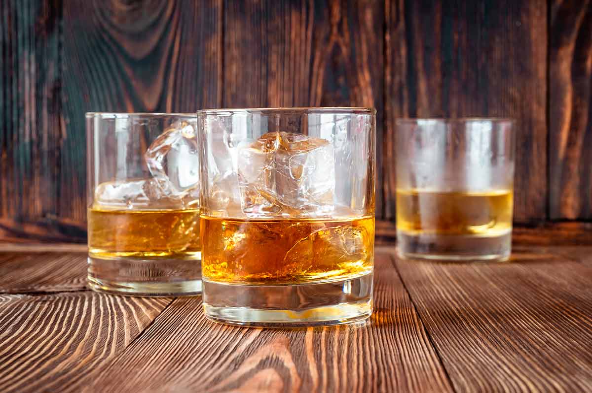 southern comfort three glasses wtih ice
