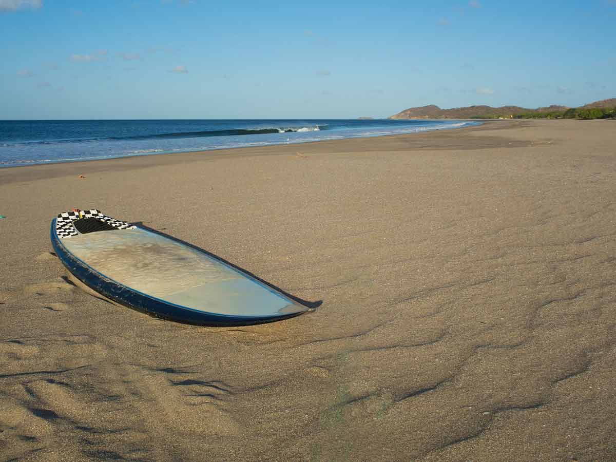 surf beaches nicaragua surfboard on the sand