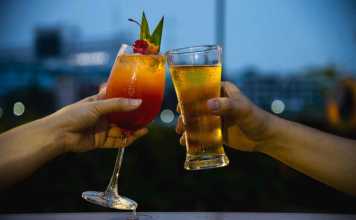 thai alcoholic drinks Couple celebration in restaurant with soft drink beer and mai tai or mai thai