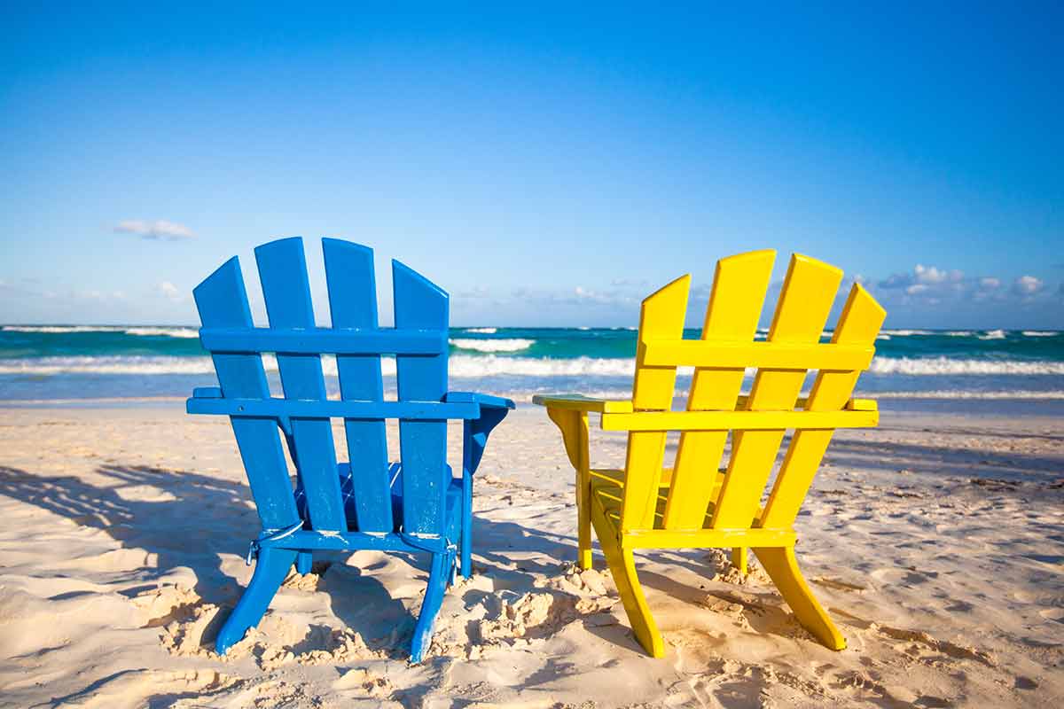the best time to visit mexico colourful beach chairs in Tulum