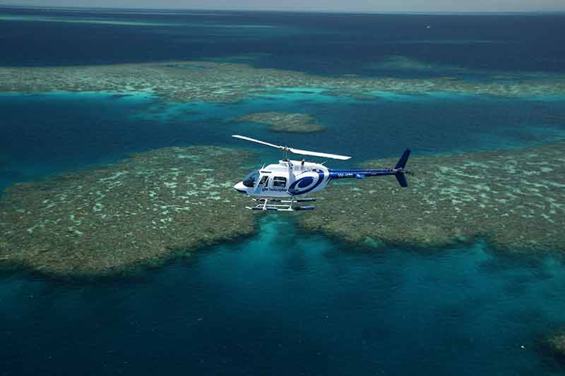 thing to do in cairns helicopter over the reef