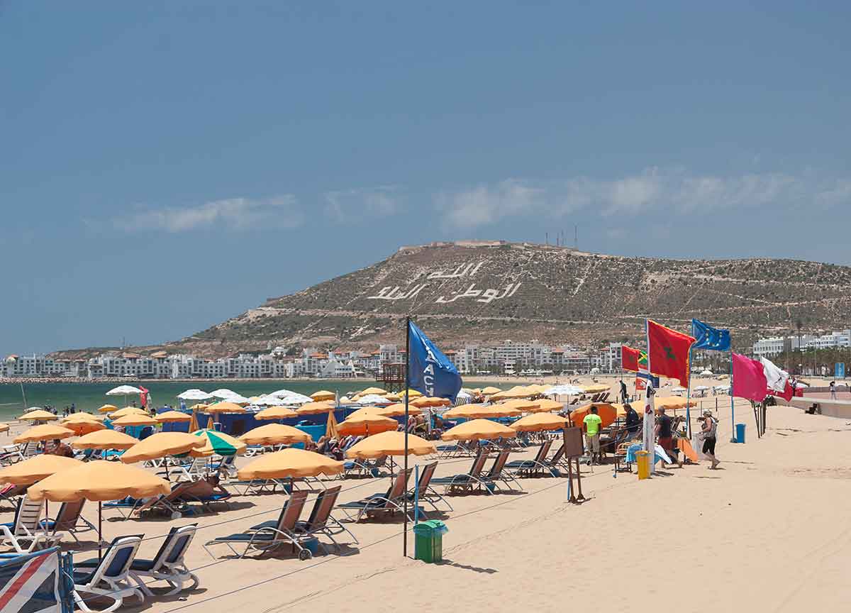 Casbah Mountain and beach umbrellas on the coast