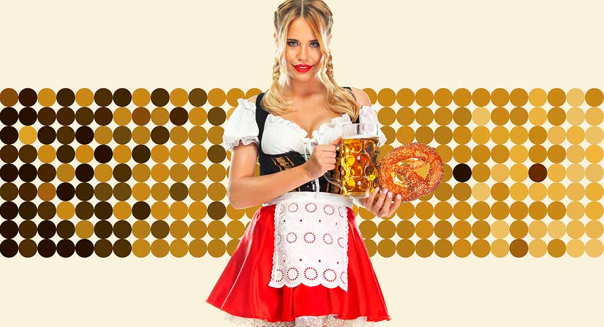 Young sexy Oktoberfest girl waitress, wearing a traditional Bavarian dirndl, serving big beer mugs .