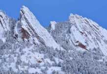 20 things to do in Boulder CO that will make you want to move there flatirons covered in snow in winter