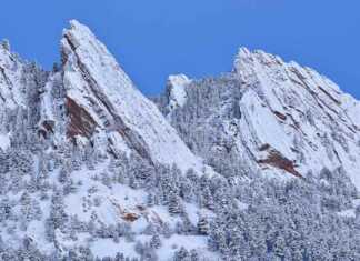 20 things to do in Boulder CO that will make you want to move there flatirons covered in snow in winter