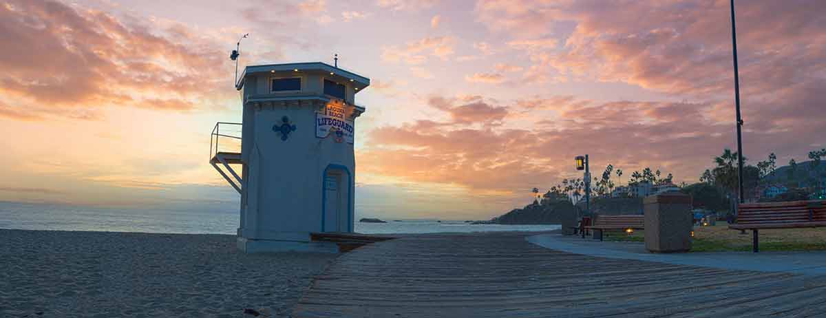 things to do in Laguna Beach Main Beach lifeguard station at sunset