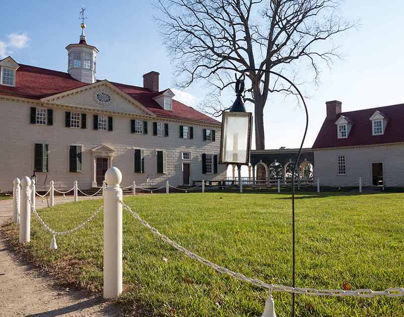 things to do in alexandria virginia George Washington's home at Mount Vernon with candle framing entrance