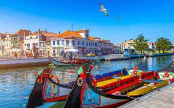Traditional Boats On The Canal In Aveiro, Portugal