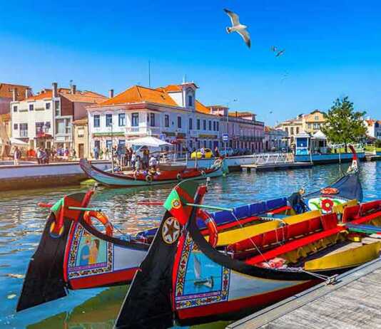 Traditional Boats On The Canal In Aveiro, Portugal