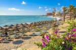 deck lounges and umbrellas on benalmadena beach