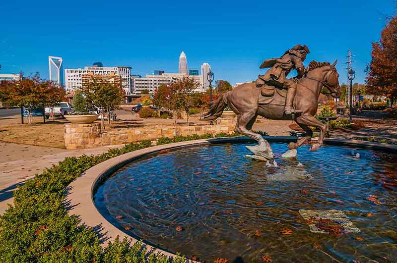 things to do in charlotte today Captain jack liberty monument pool in autumn.