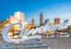 20 Things To Do In Cleveland, Ohio That Prove It’s One of America’s Most Underrated Cities things to do in cleveland ohio Cleveland sign with city skyline in the background