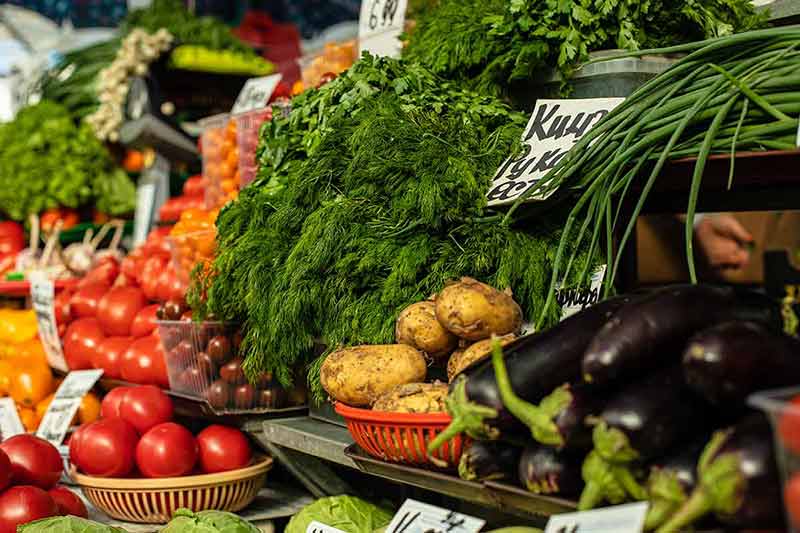 Fresh Vegetables At A Farmers Market Indoors