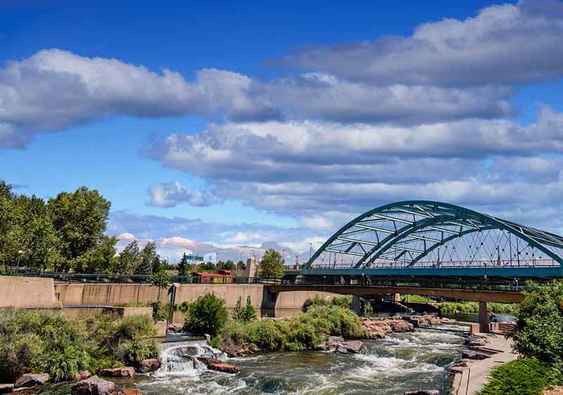 Platte River And Bridge In Denver