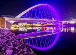 20 things to do in Des Moines that will surprise you Des Moines, Iowa, skyline and bridge illuminated at night