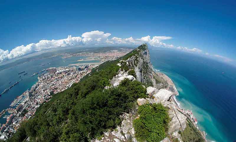 things to do in gibraltar great britain Fisheye view of Gibraltar rock, bay and town from the Upper Rock