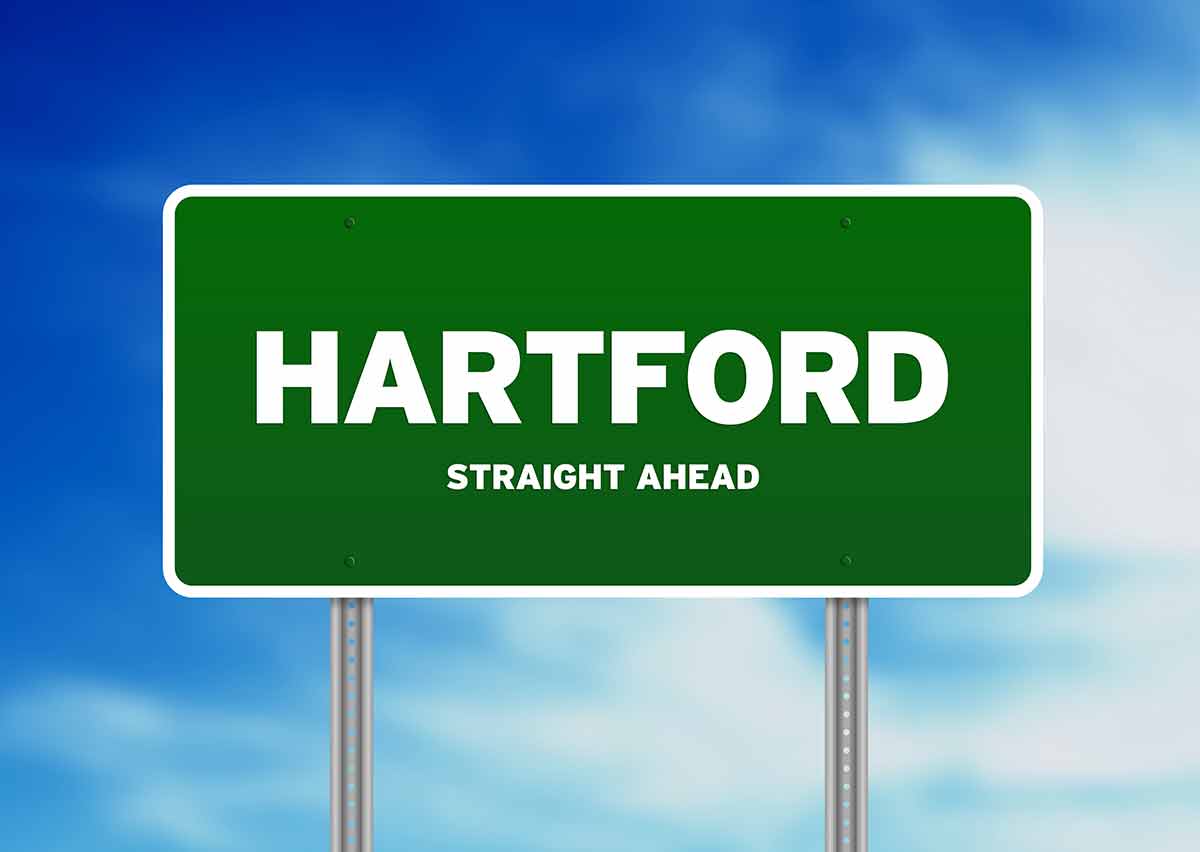 things to do in hartford ct green highway sign with the words 'Hartford straight ahead'