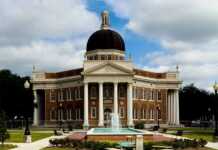historic building with grey dome and fountain