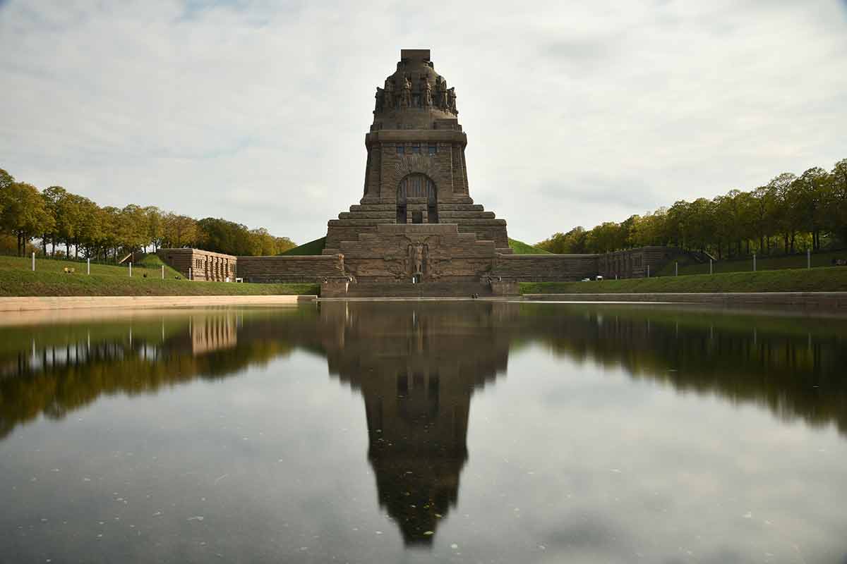 Pond Reflecting The Monument To The Battle Of The Nations