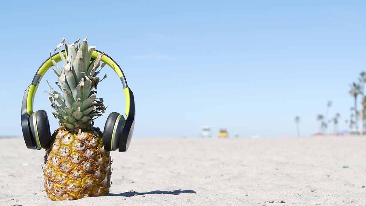 things to do in malibu pineapple wearing headphones