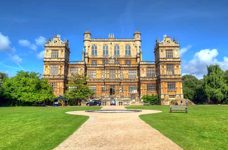 things to do in nottingham for students green lawn and driveway leading up to Wollaton Hall
