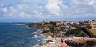 things to do in old san juan coastal view of cemetery and skyline from fort