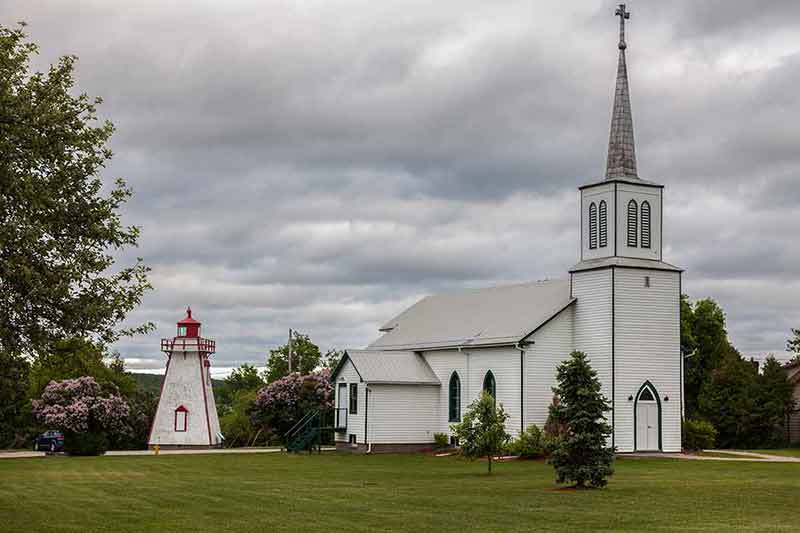 Manitowaning Lighthouse And Church