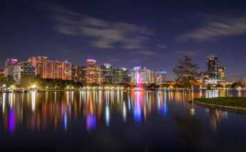 things to do in orlando at night city reflected in the lake