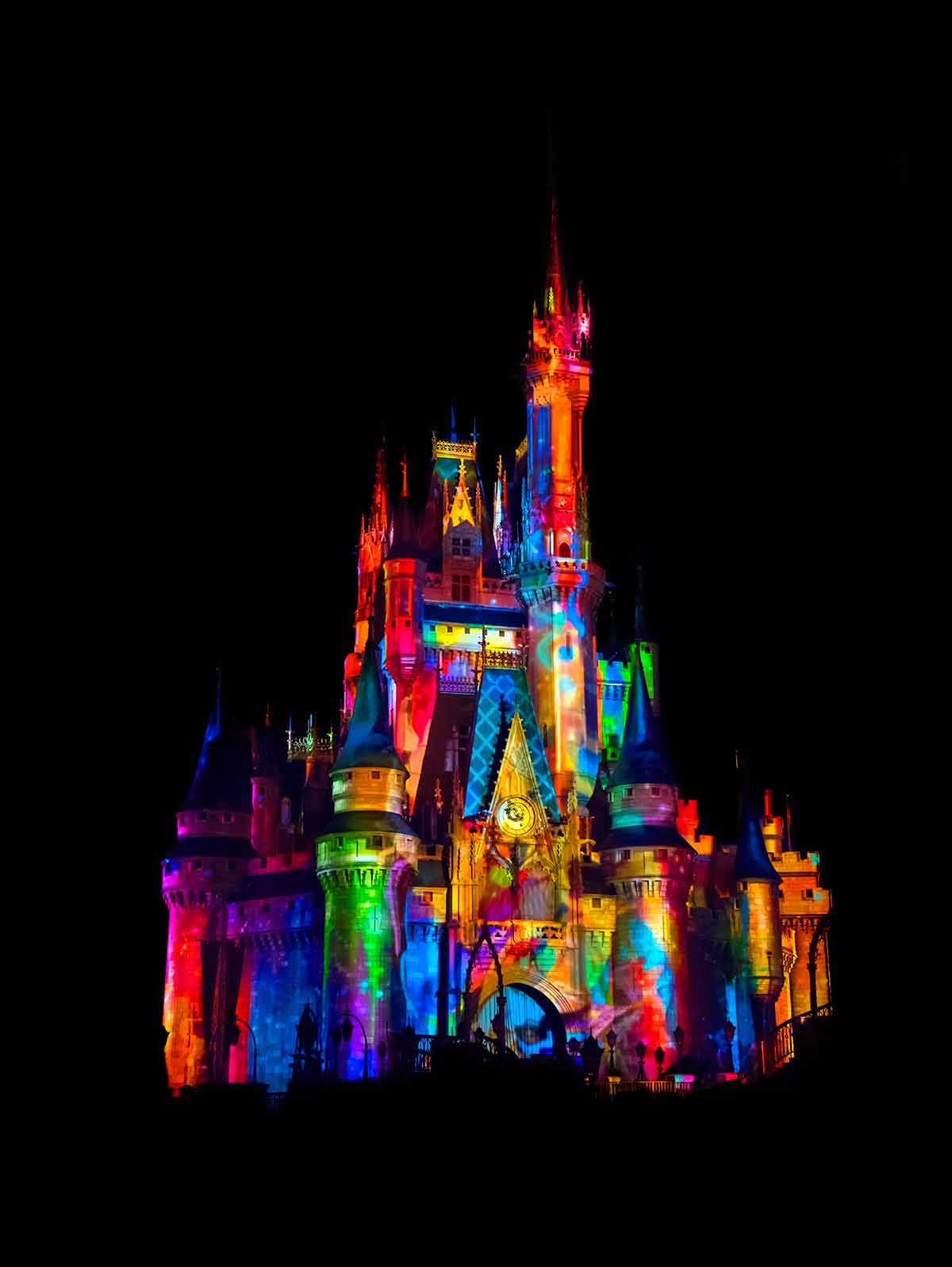 things to do in orlando at night with family colourful lights on the disney castle