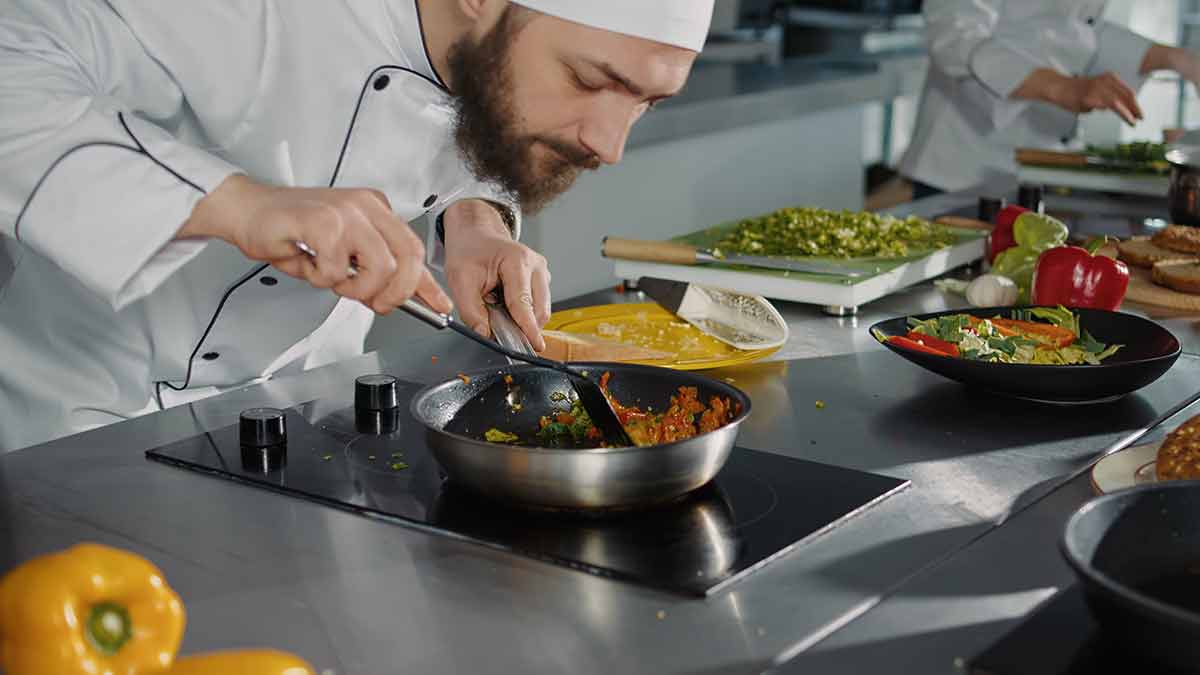 Professional Cook Preparing Culinary Recipe With Vegetables