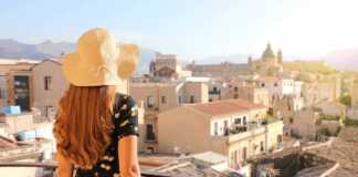 Young Lady Looking Palermo Cityscape From Balcony