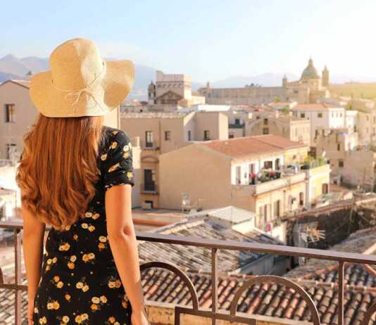 Young Lady Looking Palermo Cityscape From Balcony