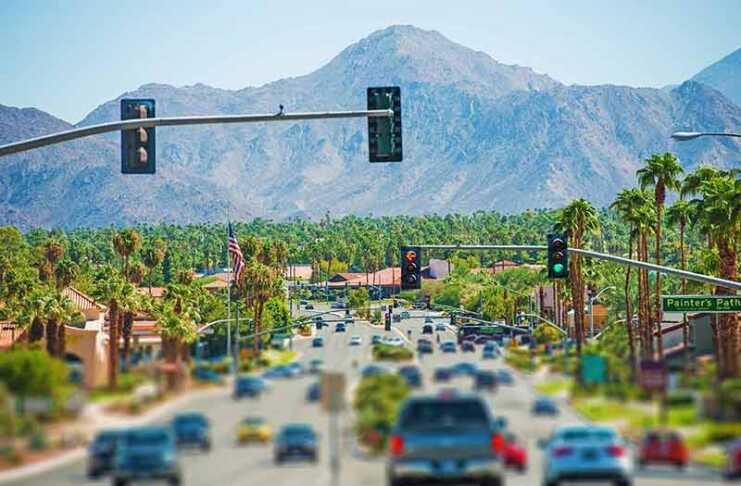 20 things to do in Palm Springs that are seriously addictive Cars driving along Palm Springs Highway towards the mountains