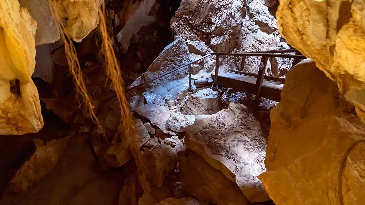 Stairs Leading Across Underground Cave Formations