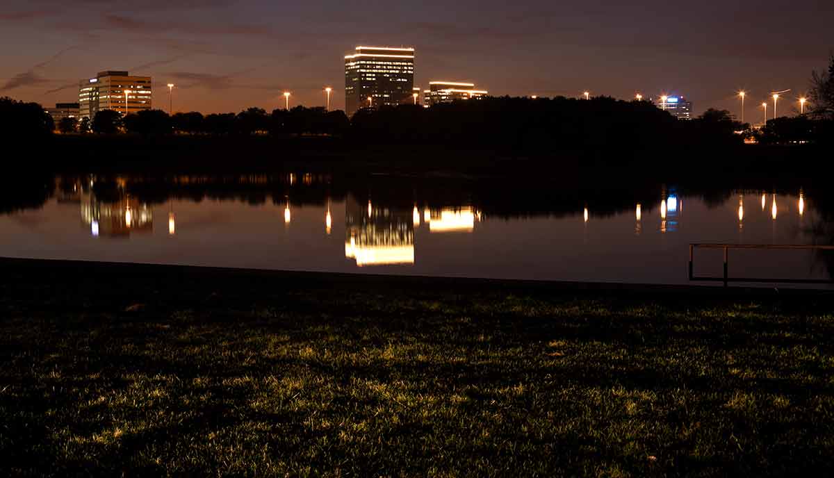 Schaumburg, Illinois office buildings reflected in the lake.