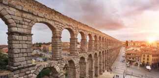 Dramatic Sunset In Famous Segovia Aqueduct, Castilla Y Leon