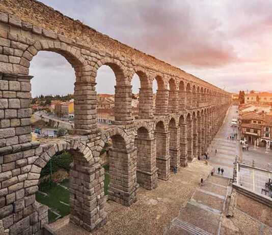 Dramatic Sunset In Famous Segovia Aqueduct, Castilla Y Leon