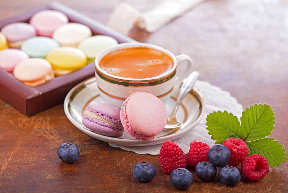 things to do in sioux falls this weekend cup of coffee with colourful macarons and berries.