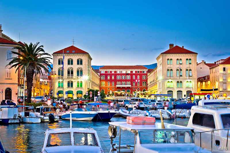 things to do in split prokurative square colourful buildings and boats