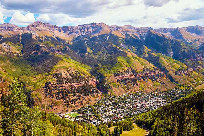 Mountain Town Of Telluride Near Fall Tucked Into Open Valley Of Mountains