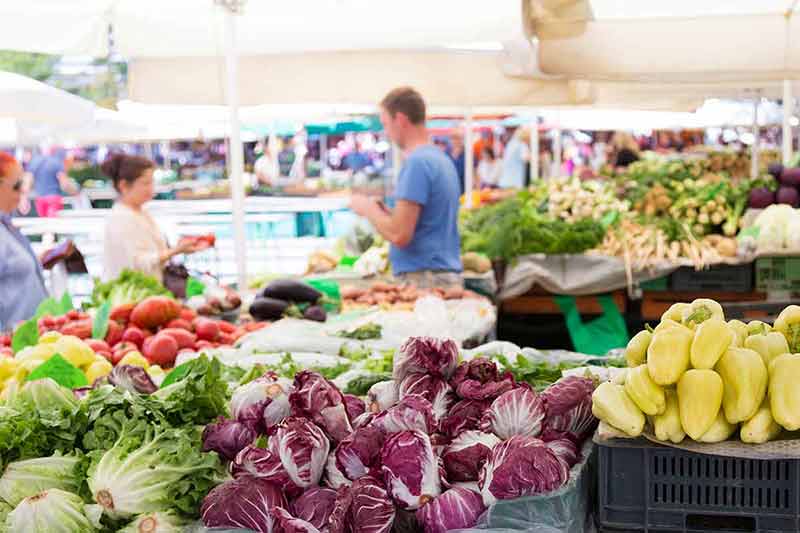 things to do in temecula this weekend Market stall with variety of organic vegetable.