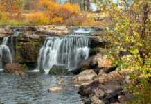 20 Things To Do In Ozark, Missouri for Small-Town Adventure Lovers things to do in the ozarks waterfall and autumn leaves