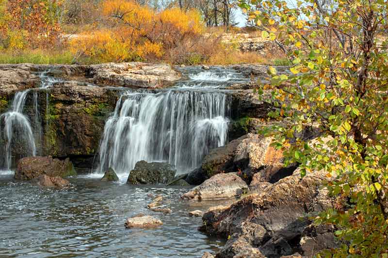 things to do in the ozarks waterfall and autumn leaves