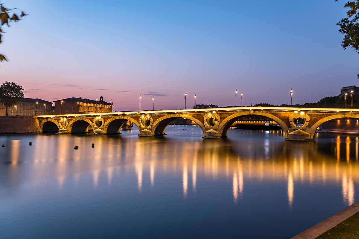 Sunset In The Garonne River And Its Bridges In Toulouse